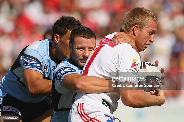 Matt Prior of the Dragons is tackled during the round three NRL match between the St George Illawarra Dragons and the Cronulla Sharks at WIN Jubilee...