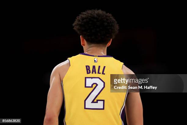 Lonzo Ball of the Los Angeles Lakers looks on during the first half of a preseason game against the Denver Nuggets at Staples Center on October 2,...