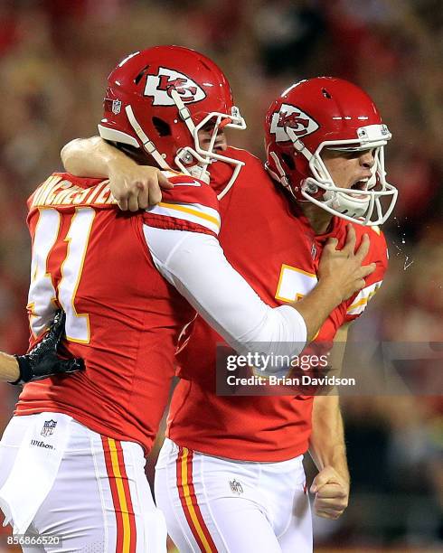 Kicker Harrison Butker of the Kansas City Chiefs celebrates with long snapper James Winchester after kicking the go-ahead field goal with 8 seconds...