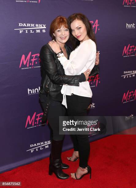 Actress Frances Fisher poses with her daughter/actress Francesca Eastwood during the Premiere Of Dark Sky Films' "M.F.A." at The London West...