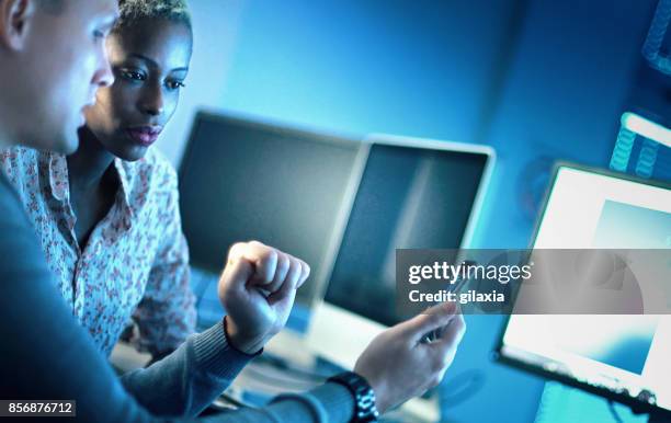 web designers at work. - blues development stock pictures, royalty-free photos & images
