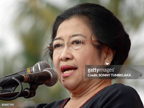 Former Indonesian president Megawati Sukarnoputri delivers a speech during a campaign event for the Democratic Party of Struggle in Bangli on the...