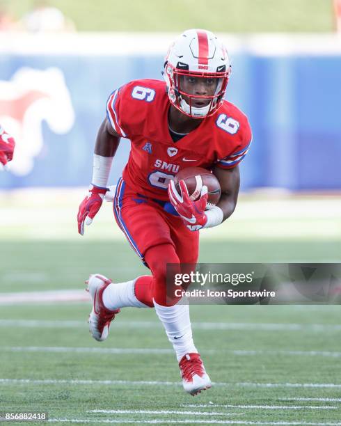 Mustangs running back Braeden West runs up field during the college football game between the SMU Mustangs and the UConn Huskies on September 30,...