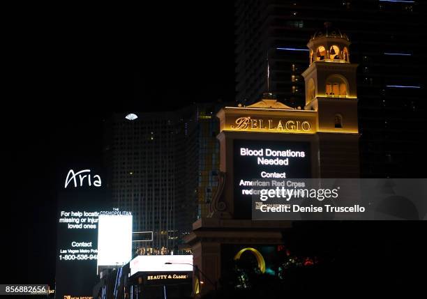 The Las Vegas strip pays tribute to the victims of the Route 91 Harvest country music festival shooting victims October 2, 2017 in Las Vegas, Nevada....