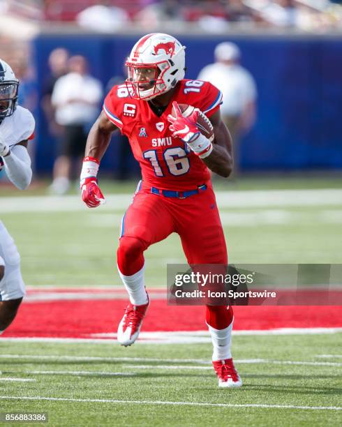 Mustangs wide receiver Courtland Sutton runs up field after a catch during the college football game between the SMU Mustangs and the UConn Huskies...