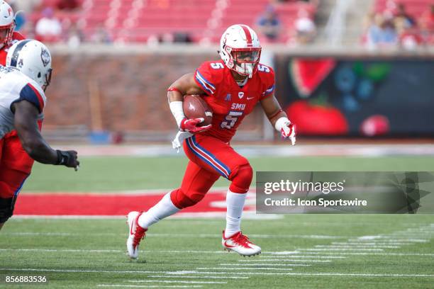 Mustangs running back Xavier Jones runs up field during the college football game between the SMU Mustangs and the UConn Huskies on September 30,...