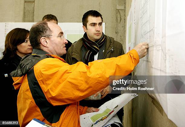 Jean-Pierre Koeltgen, hospitality and ticketing of FIFA and Hans-Joerg Otto, construction manager of the Rudolf Harbig Stadion during the inspection...