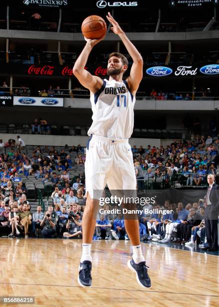 Jeff Withey of the Dallas Mavericks shoots the ball against the Milwaukee Bucks during the preseason game on October 2, 2017 at the American Airlines...