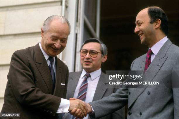 Alexander Dubcek, Czech politician and figurehead of the 'Prague Spring' in 1968, received by Laurent Fabius, right, during his visit to Paris on...