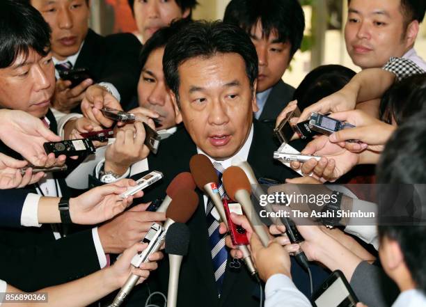 Main opposition Democratic Party deputy president Yukio Edano speaks to media reporters after his meeting with Japanese Trade Union Confederation...