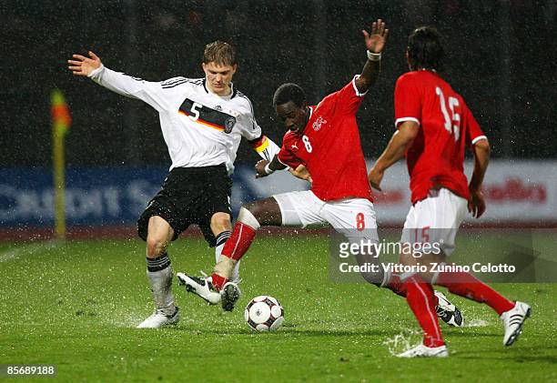 Germany defender Florian Jungwirth and U20 Switzerland midfielder Adilson Tavraes Cabral in action during the Under 20 international friendly match...