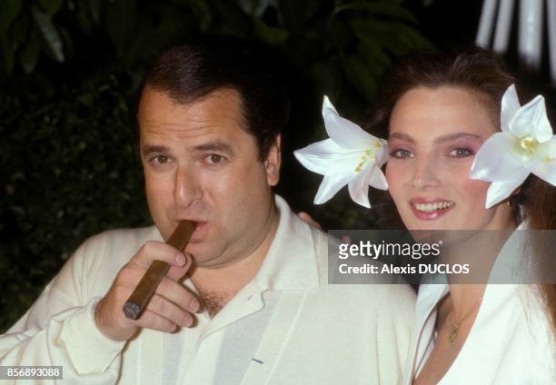 Paul-Loup Sulitzer et sa femme Alejandra di Andia lors du mariage d'Eddie Barclay le 5 juin 1988 a Paris, France.