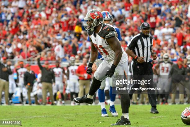 Tampa Bay Buccaneers defensive end Robert Ayers Jr. Celebrates a defensive stoppage during an NFL football game between the New York Giants and the...