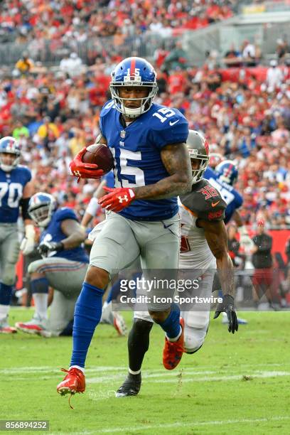 New York Giants wide receiver Brandon Marshall runs after a reception during an NFL football game between the New York Giants and the Tampa Bay...