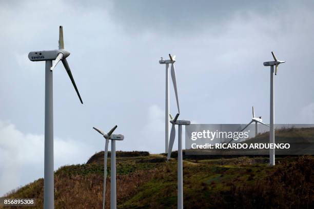 Damaged wind turbines are seen in the aftermath of Hurricane Maria in Naguabo, Puerto Rico on October 2, 2017. President Donald Trump strenuously...