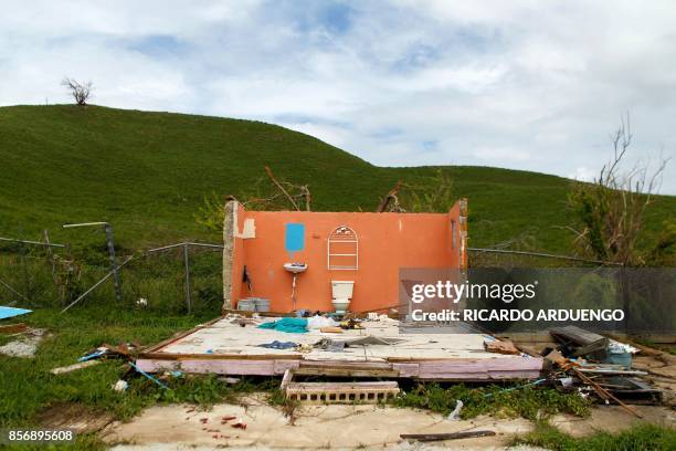 Destroyed house is seen in the aftermath of Hurricane Maria in Naguabo, Puerto Rico on October 2, 2017. President Donald Trump strenuously defended...