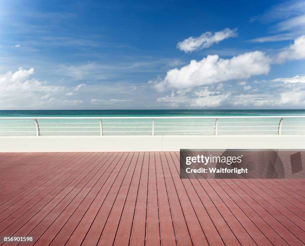 empty sidewalk with beach background - roadside stock pictures, royalty-free photos & images