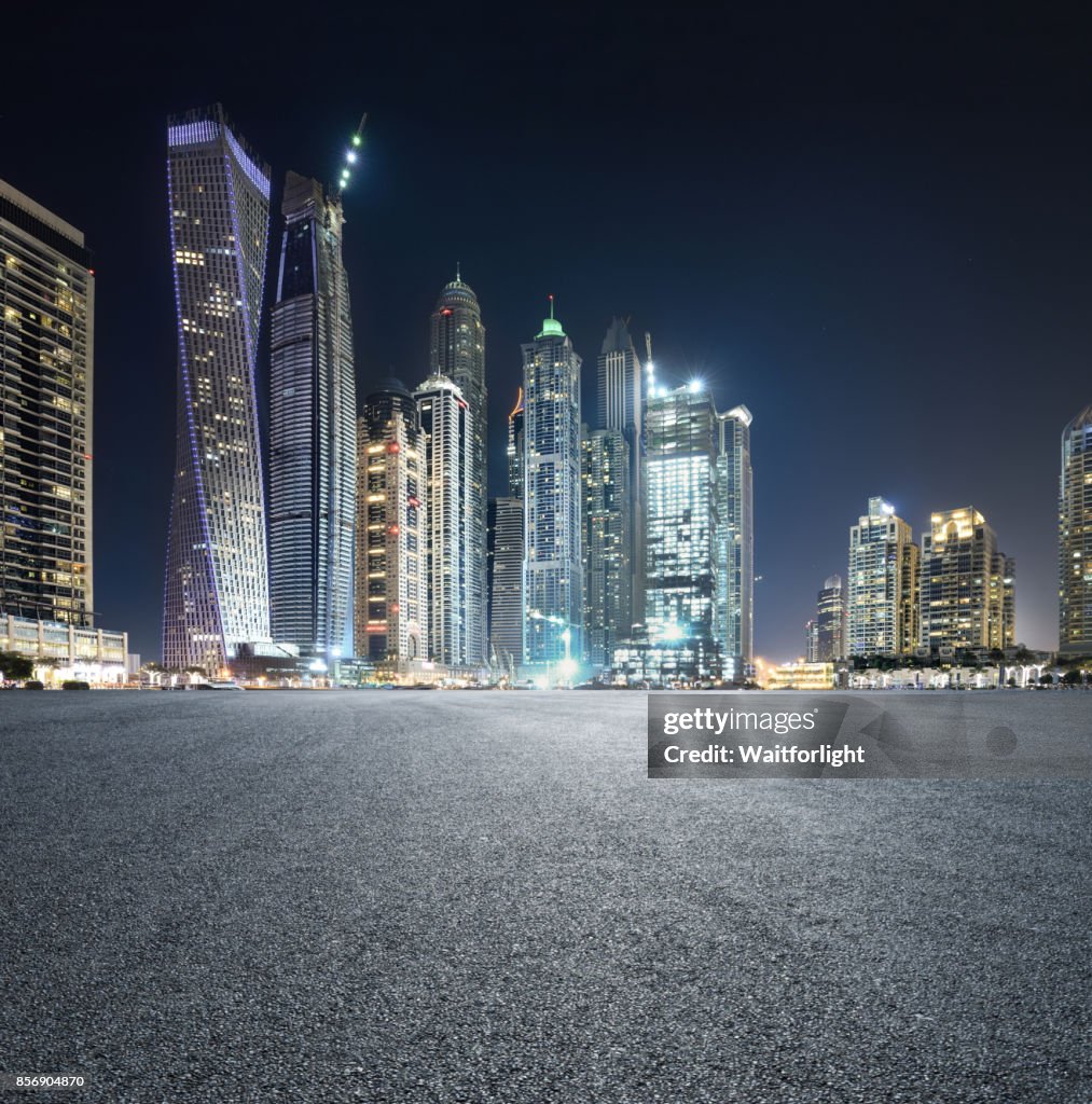 Car park with Dubai marina background