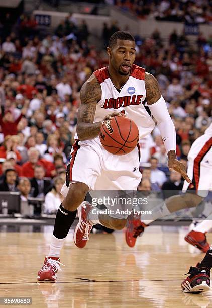 Terrence Williams of the Louisville Cardinals drives against the Arizona Wildcats during the third round of the NCAA Division I Men's Basketball...