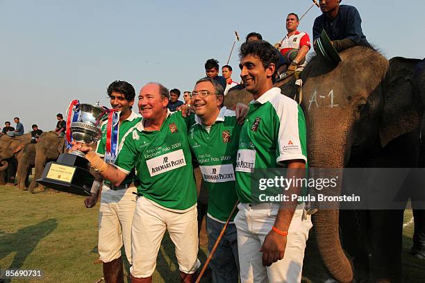 Angad Kalaan, Peter Prentice, Oliviero Bottinelli and Uday Kalaan of the Audemars Piguet elephant polo team celebrate their win in the finals of the...