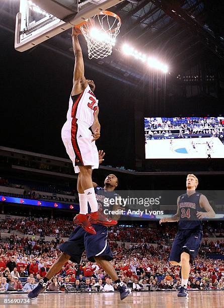 Jerry Smith of the Louisville Cardinals dunks against the Arizona Wildcats during the third round of the NCAA Division I Men's Basketball Tournament...