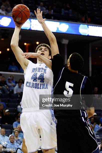 Tyler Zeller of the North Carolina Tar Heels shoots the ball over Austin Daye of the Gonzaga Bulldogs during the NCAA Men's Basketball Tournament...