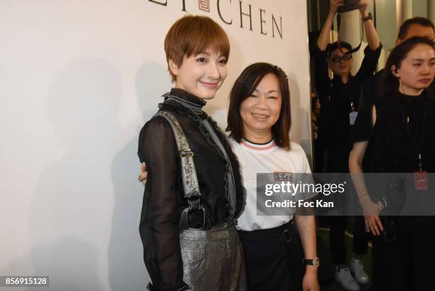 Actress Wu Xin and designer Wang Chen Tsai-Hsia from Schiatzy Chen attend the Schiatzy Chen show as part of the Paris Fashion Week Womenswear...