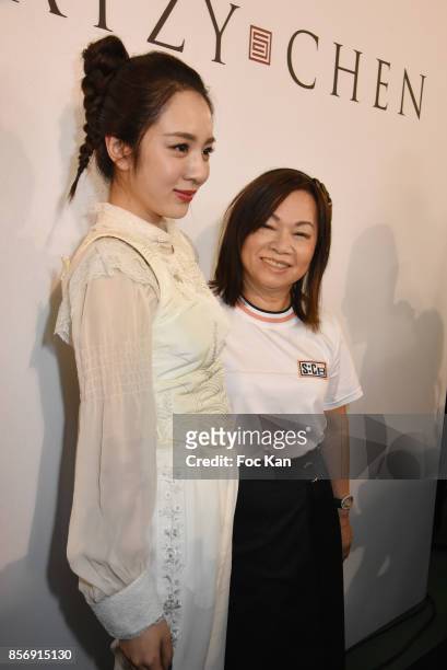 Designer Wang Chen Tsai-Hsia from Schiatzy Chen and a guest attend the Schiatzy Chen show as part of the Paris Fashion Week Womenswear Spring/Summer...