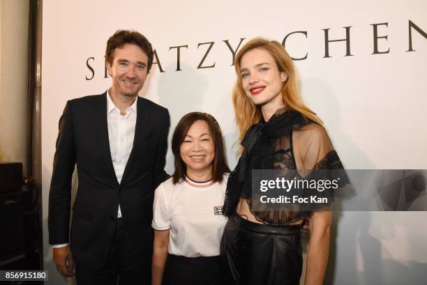 Antoine Arnault, designer Wang Chen Tsai-Hsia and Natalia Vodianova attend the Schiatzy Chen show as part of the Paris Fashion Week Womenswear...