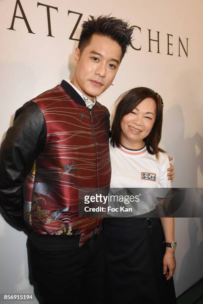 Tang Hao Chou from nickthereal and designer Wang Chen Tsai-Hsia from Schiatzy Chen attend the Schiatzy Chen show as part of the Paris Fashion Week...