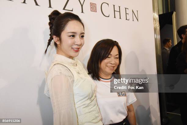 Designer Wang Chen Tsai-Hsia from Schiatzy Chen and a guest attend the Schiatzy Chen show as part of the Paris Fashion Week Womenswear Spring/Summer...