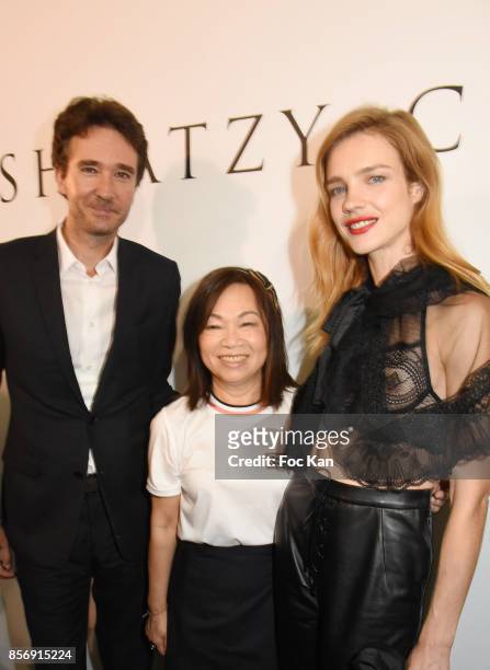 Antoine Arnault, designer Wang Chen Tsai-Hsia and Natalia Vodianova attend the Schiatzy Chen show as part of the Paris Fashion Week Womenswear...