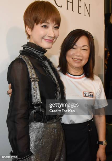 Actress Wu Xin and designer Wang Chen Tsai-Hsia from Schiatzy Chen attend the Schiatzy Chen show as part of the Paris Fashion Week Womenswear...