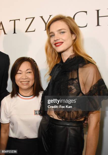 Designer Wang Chen Tsai-Hsia and Natalia Vodianova attend the Schiatzy Chen show as part of the Paris Fashion Week Womenswear Spring/Summer 2018 on...