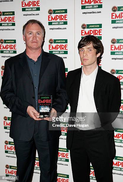 Executive producer Kevin De La Noy and actor Cillian Murphy pose in the press room with the Best Film award for 'The Dark Knight' at The Jameson...