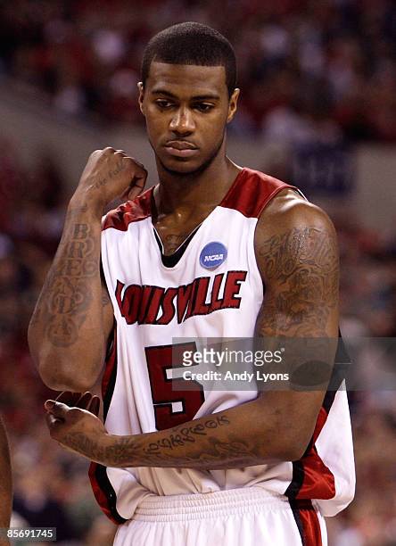 Earl Clark of the Louisville Cardinals looks on against the Michigan State Spartans during the fourth round of the NCAA Division I Men's Basketball...