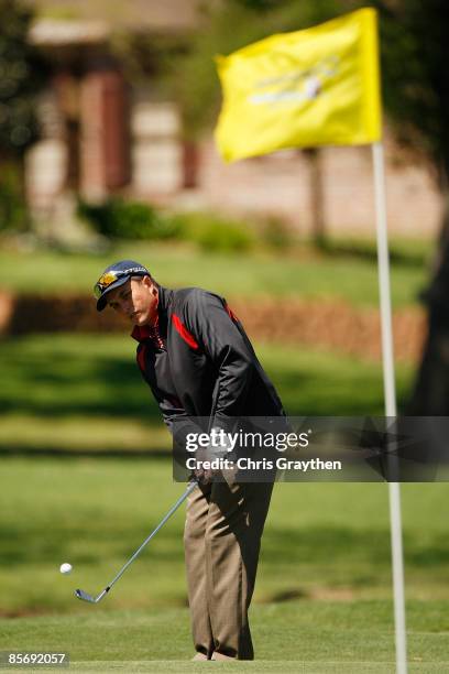 Scott Gardiner chips onto the 3rd green during the final round of the 2009 Chitimacha Louisiana Open at Le Triomphe Country Club on March 29, 2009 in...