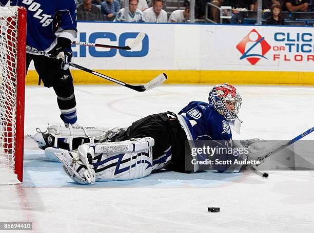 Karri Ramo of the Tampa Bay Lightning watches as the puck deflects away from the goal during the game against the Ottawa Senators at the St. Pete...