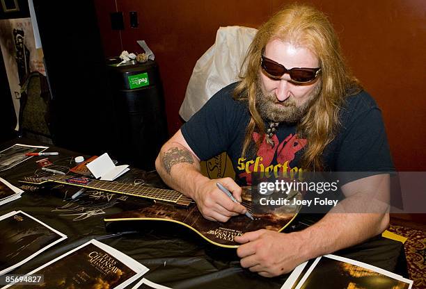 American actor and musician Andrew Bryniarski signs a guitar at HorrorHound Weekend Indianapolis, Day 3, at Marriot Indianapolis East on March 29,...