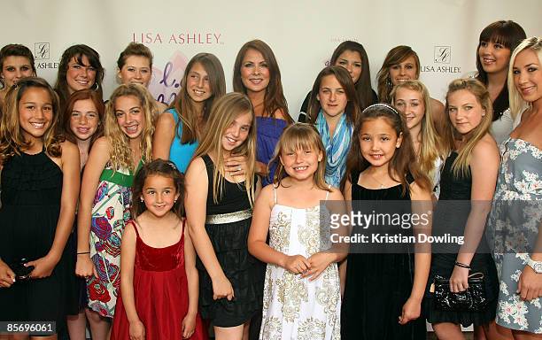 Lisa Ashley arrives with young guests at the launch of the new Fox Reality Channel show Househusbands of Hollywood at Zin Bistro Americana...