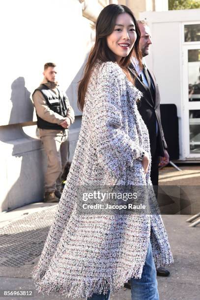 Liu Wen is seen arriving at Chanel show during Paris Fashion Week Womenswear Spring/Summer 2018on October 3, 2017 in Paris, France.