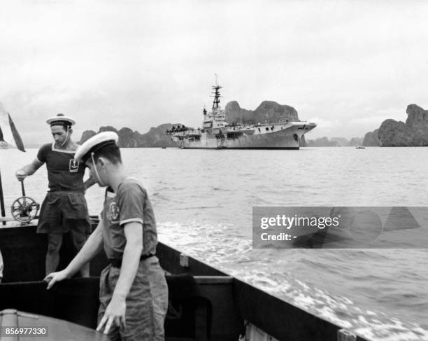 Picture released on May 1954 of aircraft carrier Belleau Wood arriving in the Ha Long Bay to relay aircraft carrier Arromanches of the French Navy,...