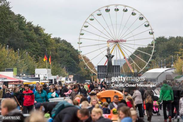 General view of an amusement area set up along 17th of June Street in Tiergarten Park near the Brandenburg Gate on German Unity Day on October 3,...