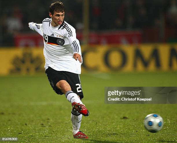 Daniel Schwaab of Germany shoots the ball during the U21 International friendly match between Germany and the Netherlands at the Werse stadium on...