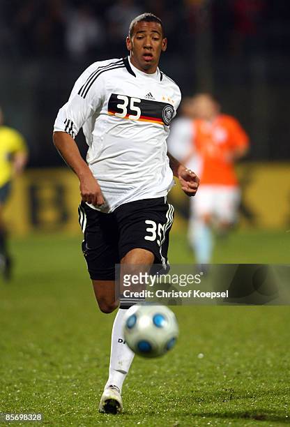 Jérome Boateng of Germany runs with the ball during the U21 International friendly match between Germany and the Netherlands at the Werse stadium on...