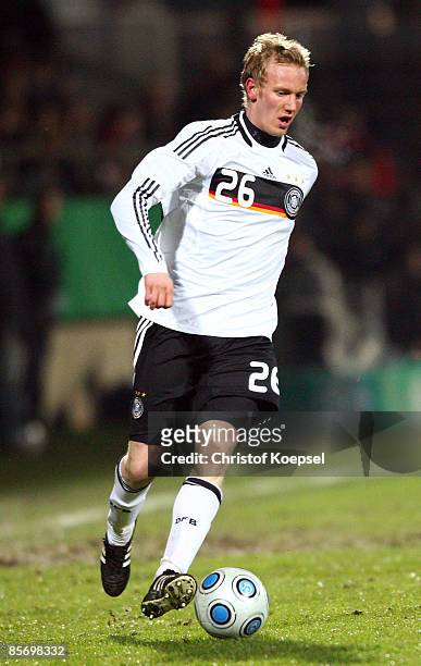 Jan Rosenthal of Germany runs with the ball during the U21 International friendly match between Germany and the Netherlands at the Werse stadium on...