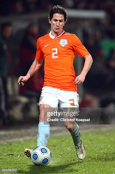 Paul Verhaegh of Netherlands runs with the ball during the U21 International friendly match between Germany and the Netherlands at the Werse stadium...