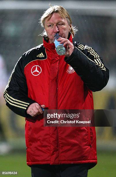 National coach Horst Hrubesch of Germany drinks water before the U21 International friendly match between Germany and the Netherlands at the Werse...