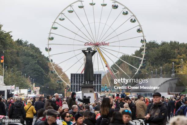 General view of an amusement area set up along 17th of June Street in Tiergarten Park near the Brandenburg Gate on German Unity Day on October 3,...