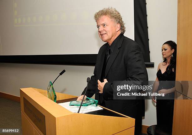 Director David Winning accepts the Best Feature award for his film "Swamp Devil" at the awards ceremony at the Closing Night Gala for the 1st Annual...